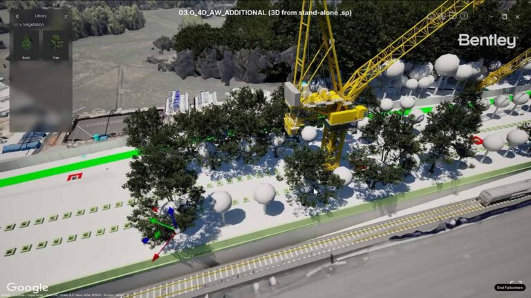 A 3D rendering of a construction site with trees, a yellow crane, spherical objects, and adjacent railway tracks, displayed in Bentley software.